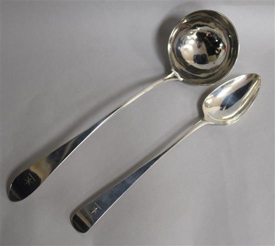 A George III Scottish silver soup ladle, Edinburgh, 1789 and a Scottish silver basting spoon, 8 oz.